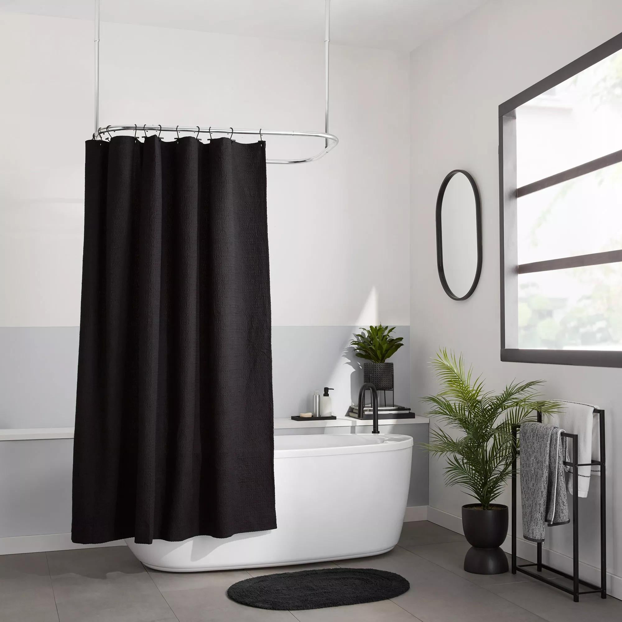 Black Oval Tufted Bath Mat